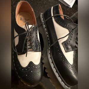 Dr. Martens Black and White Brogue Flats